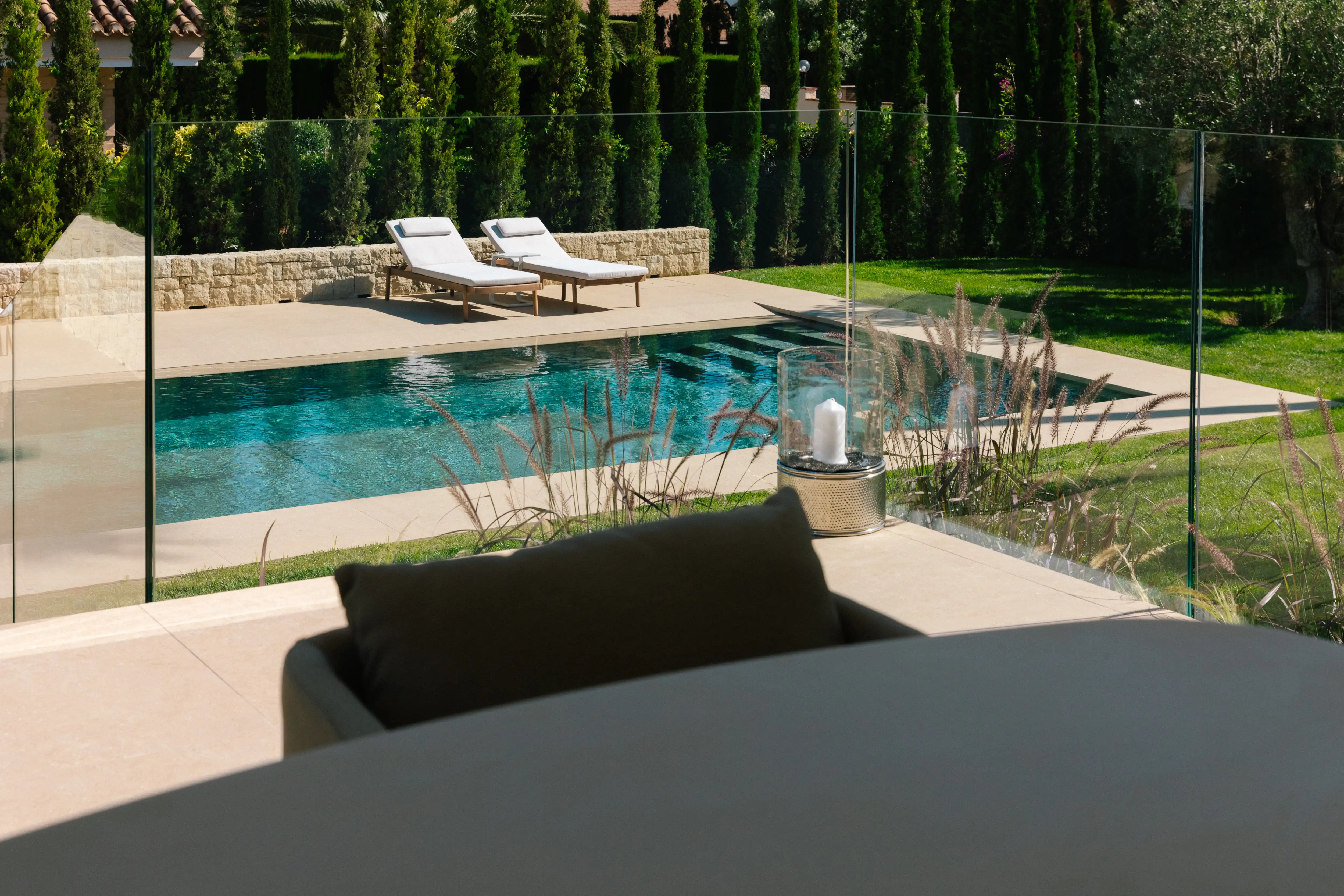Outdoor terrace and pool area after villa renovation in Campolivar Valencia image 1