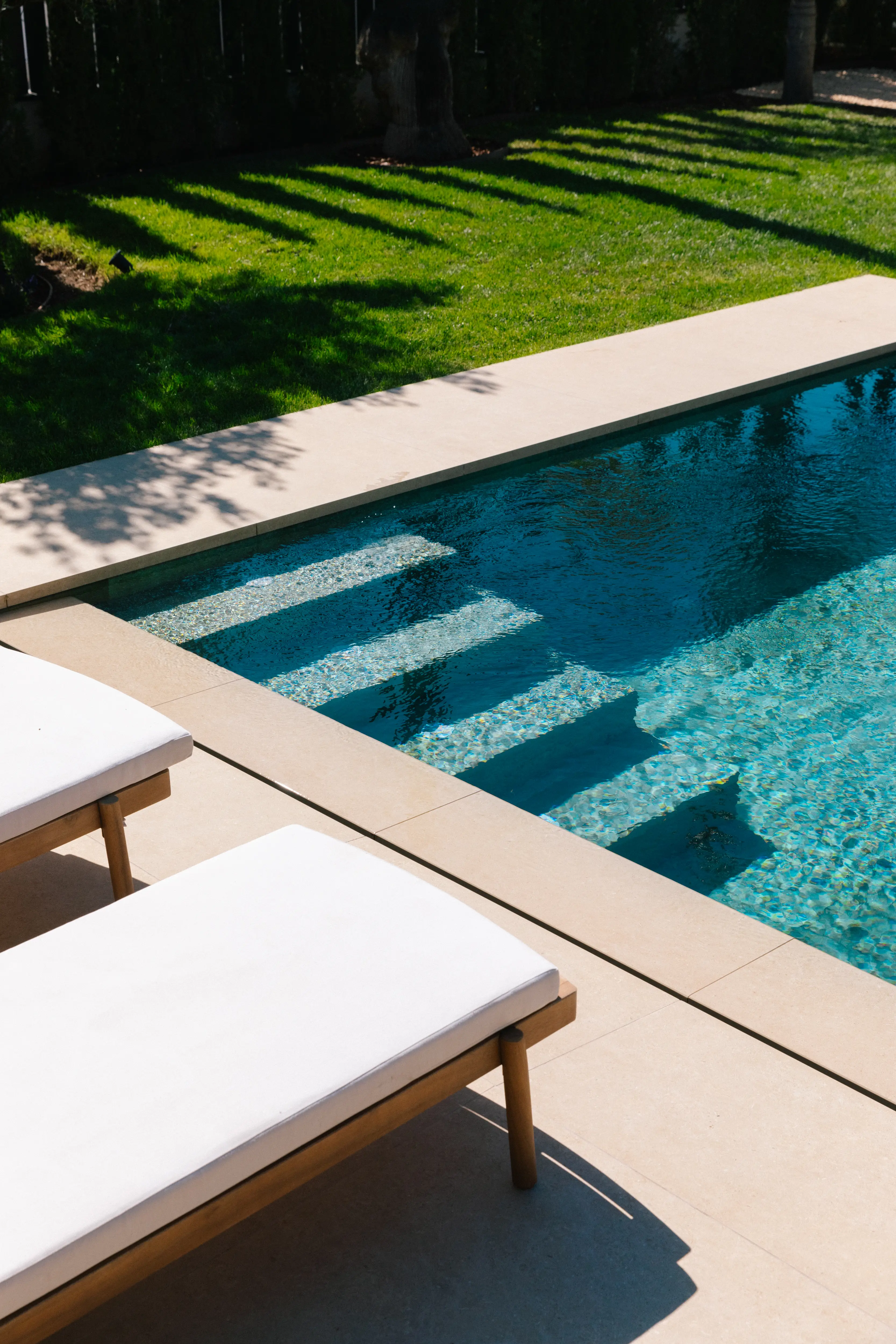 Outdoor terrace and pool area after villa renovation in Campolivar Valencia image 79