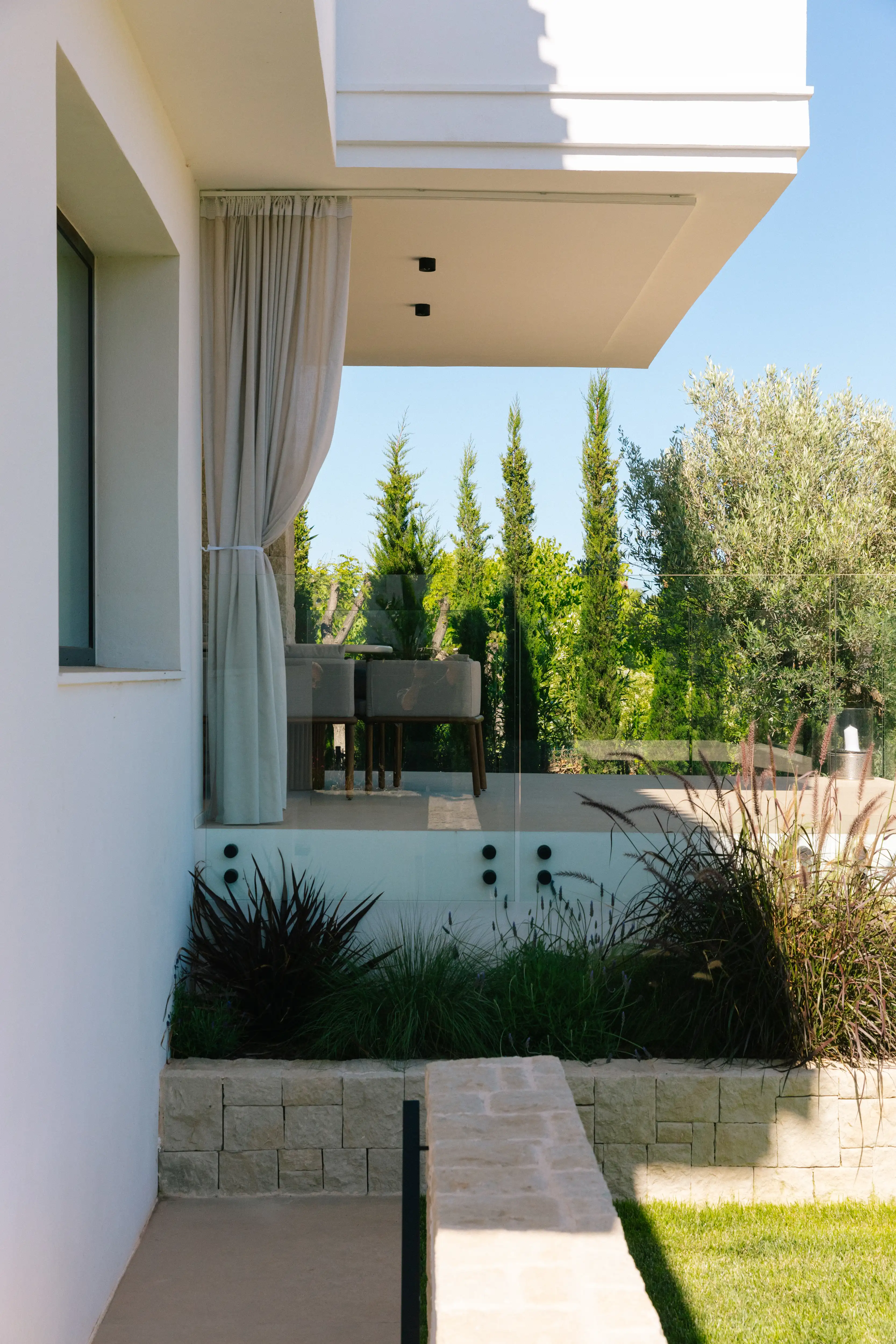 Outdoor terrace and pool area after villa renovation in Campolivar Valencia image 83